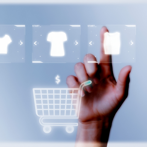 A person interacting with a futuristic touch screen interface, browsing an online shopping application.
